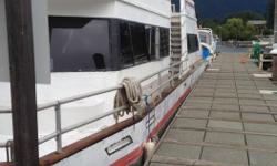 Located on beautiful cowichan lake on Vancouver island 56 ft long ,14ft wide,aft stateroom with ensuite,bunk room,upper queen size penthouse,oak kitchen with eating bar,moored at marina on cowichan lake.merc 120 inboard motor.upper deck with slide and