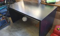 Ikea Desk in a dark brown color. Top is a little patchy but it's a great size and in good shape otherwise. 55"w X 29/5" deep X 29/5" H. UVic Area.