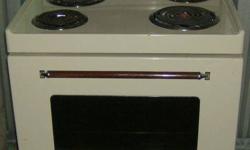almond colour Inglis stove,clean $50 obo