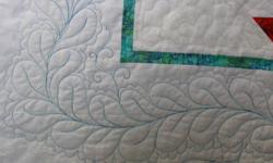 Wonderfully light with feathered quilt details
86 x 108"  A real stunning quilt