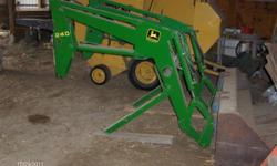 John Deere 240 self loading loader, bucket and 2 prong bale spear. Fits 40, 50, 55, 2 wheel drive series tractors. Great Shape. Don't need anymore. Please call Roy at 613-542-2712