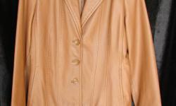 Great jacket with tailored stitching detail. In perfect condition. Nice buttery soft leather. As new. Size Large. Color is the "lighter" brown shown in the majority of the pictures. Can arrange drop-off in Victoria.