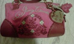 Authentic Juicy couture purse. Its the smaller speedy bag. price can be lowered but please no low balls. Feel free to msg me with any questions at all. im located in surrey.