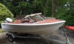 Vintage 16' K&C Thermoglass boat, 60 hp Johnson 2 stroke, 1992 EZ Loader trailer. Good candidate for restoration, or rehab as the boat and motor both need work. Trailer is good. Deep V makes this a rather seaworthy little boat.