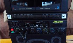 takes cassette tapes have couple already in the machine..am/fm radio..2 microphones..all works great