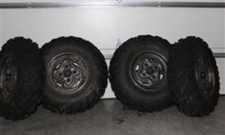 Kawasaki brute force 750 stock tires and wheels. New condition.