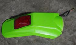 Rear fender with tail light, light works fine, fender is in excellent shape, 2002, may fit other year and model KLX, KDX, KLR 200,220,250,300.