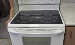 White,  2.5 years old.  Glass ceramic top and self-clean oven.  Excellent Condition.