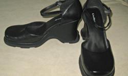 Kenneth Cole Unlisted Platform Wedges. Ladies size 7M. All man made materials. Very funky and comfortable shoes! Worn a couple of times indoors only, so are in brand new condition. Pick-up only, thanks!