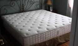 one year old  Sears-O-pedic king size bed   , firm esquire natural mattress 
  - includes metal headboard , smoke free home ,  paid  $2150.00
   reason for selling, moved & bed is to big for bedroom.