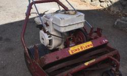 Vintage reel mower runs great cuts even better . Solid lawnmower !