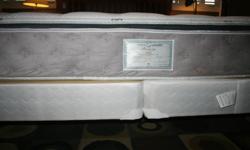 Less than 1 month old, firm king size mattress with split box spring and bed frame included.