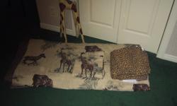 Stay warm and cozy with a nice King Size  Bedroom ensemble, which includes:
Comforter
1 set of sheets - 2 sheets and 2 matching pillow cases
Bed skirt
2 Shams
This set is in excellent condition, used only in a guest room. The Giraffe comes with the set to