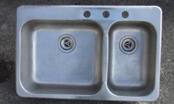 One and a half stainless steel kitchen sink.  31" x 20.5" x 7".
Very good condition.