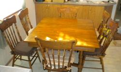 Beautiful table and chairs for sale!
 
We estimate these are about 100 years old.
At one time covered in paint and scratches, now been refinished!
You can see the fine condition of the table & 6 chairs from the pictures
But the pictures don't do it