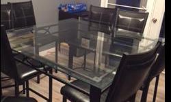Table is 54? X 54? Glass Top with Metal Frame
Table is 35? High
8 Counter Height Chairs
Chairs Are Leather Seats with Black Metal Frames
PLEASE NOTE KITCHEN TABLE & CHAIRS ARE NOT ON OUR SITE..PLEASE CALL 306-790-7000
Please visit www.prestigeauctions.ca