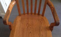 Wooden office chair in good condition.
Has inserts on feet for casters. Chair does not have the casters.