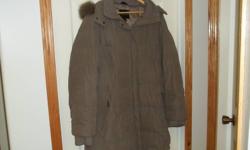 Sand (tan) colored 3/4 length jacket.  Storm cuffs and detachable hood.  Size L 14-16.  Clean and in excellent condition.  Nice stitching detail.   Very warm and comfortable.   No pets or smoking home.