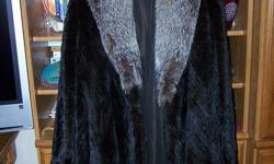 Mink fur coat with Fox fur coller.  Size 12-14.