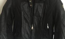 Black ladies leather riding jacket, with CE armour in shoulders, elbows and back.