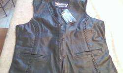 ladies leather vest for sale will fit a size 10 in ladies very nice soft leather with piping. never used still with tags.
