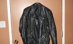 Wore this jacket one season, very soft leather, elastic gather at the sides, zip out liner.  Ladies XL, too big for me now.
