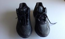 A nice pair of ladies, black, Reebok running shoes, size 6.