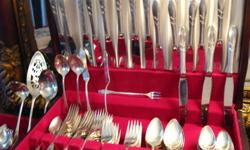 Amazing Christmas Present for the Lady with a large Family
Huge Community Silverplate Flatware
Lady Hamilton pattern
141pieces plus walnut anti-tarnish cas
Place Settings for 16
includes:
Individual butter knives
Round cream/bullion soup spoons
3 Serving