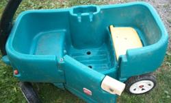 large childs wagon with seats. door to the wagon opens and closes.  1 seat lifts to reveal storage room.    call 604 858 6955