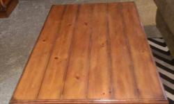 Large wooden Coffee table with shelf underneath as well as 2 drawers. There are some minor Scratches......as with anything made of wood.
Must be picked up