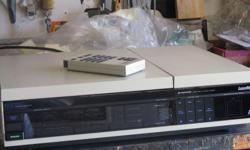 Pioneer PR8210 industrial laser disc player with remote and discs. Pristine condition. Less than 20 play time.