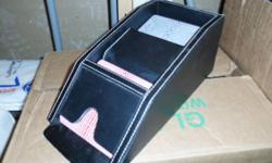 Leather card holder/dispener. Bought for poker nights but only used it a few times. Comes with unopened deck of cards aswell. New black leather with white stitching very nice. emails only please