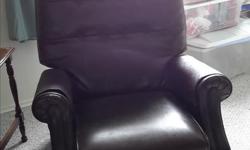 Leather chair. $50.00 dark brown.