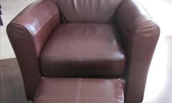 Dark brown leather chair and ottoman for sale. Very good quality leather in excellent condition. No stains or rips. Made in Canada. Measurements: 39" high X 36" wide. Original value: $1200 (have the receipt). Asking $345. Call (613) 257-5069 or email.