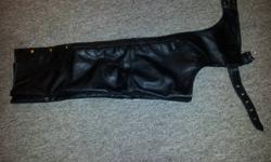 New Leather King chaps.  Black. Men's size large. Removable insulation. Trimmed to fit 31 length.  Bought them and never ended up wearing them; went to textile instead.