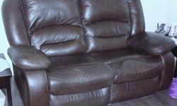 1 Leather Electric 2 seat reclining Love Couch. In excellent condition, no rips tears or smudges. Smoke free home.
Dimensions 65 inches wide by 36 inches deep by 40 inches high.
Dimensions extended 65 inches wide by 66 inches deep by 40 inches high.
