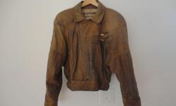 Immaculate condition high-quality women's soft leather jacket from The Leather Ranch. Made in Canada.
Bought new for $450 and only worn a couple of times.
Vintage style bomber jacket in as-new and very clean condition.
Size medium.