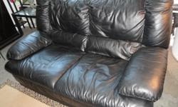 Black leather IKEA loveseat. Good condition, comes from a home with no smokers, pets or children. Very comfortable; low European styling. Pick-up only; downtown Toronto location. Selling to finance my film!