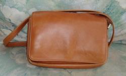 GOOD QUALITY LEATHER SHOULDER PURSE WITH
COMPARTMENTS. $8.00