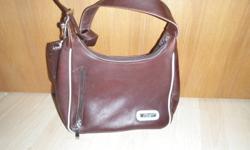 Brown Leather purse with change purse attached.  Like New.
$45.00