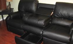 EL RAN pasadena reclining sofa .3 seat wall saving reclining on both ends.middle folds down to create a table with 2 cup holders .storage drawer under the middle seat. Sofa is on the sears.ca for 1579.99 it is called the pasadena .the inspection tag is