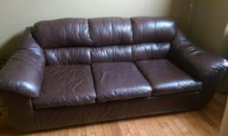 Brown leather sofa about 8 yrs old good shape with no rips or tears. OBO