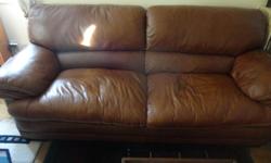 Leather couch in great condition comfortable an quality make. Sleep a 6 foot person with a wide birth. Moving an needing to part with belongings inquire with any questions