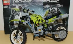 LEGO Technic 8291 Dirt Bike from 2008. Contains well over 200 pieces. The number one sticker on the front is a recent reprint. Instruction booklet included.