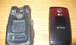 Multi coloured black/red flip phone. Comes with Leather case.