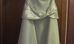 This dress was purchased from Bryan's in Edmonton, is in excellent condition.  Size is 7/8, see pictures for details.