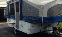 Very good shape, easy to tow, well cared for popup trailer. Never left the island, stored inside during the winters. Canvas in great shape. Fridge, sink in very good conditions. Heated mattresses. Queen on one side, Double on other side. Ample seating