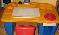 A great desk for your child ages 2-5
 
The desk has compartments for everything from markers, crayons, stamps and coloring books!
 
The desk has a lamp that works from the top and the bottom
