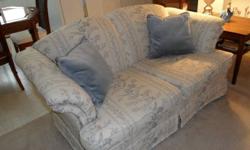 - Livingroom couch & matching loveseat in light-coloured background with subtle blue-grey & dusty rose floral design.  Comes with 4 blue accent cushions.
- Dimensions:  Couch is 86" x 36"  Love seat is 64" x 36"
- In pet-free/smoke-free home.
- Excellent