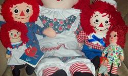 This is an excellent assortment of Raggedy Ann dolls. The largest one is 24" tall, in brand new condition, and is the 85th Birthday Doll made by Applause. Raggedy Andy is 12" tall and has 80th embroidered on his foot, also made by Applause and also in